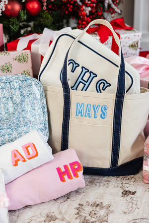 Custom monogrammed clear pouch and travel accessories set.