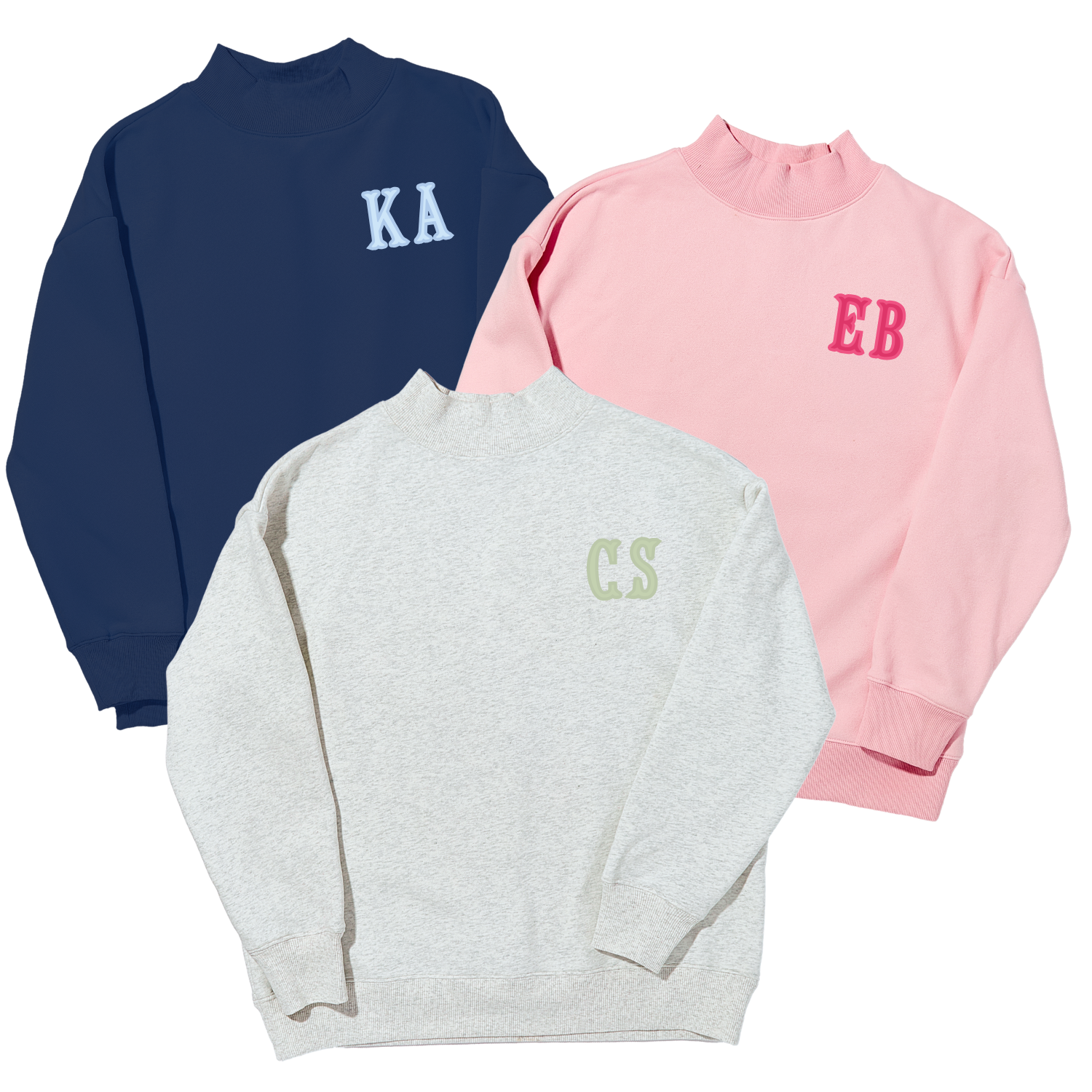Light blue and white striped mockneck sweatshirt with light blue 'AD' applique monogram, flat lay