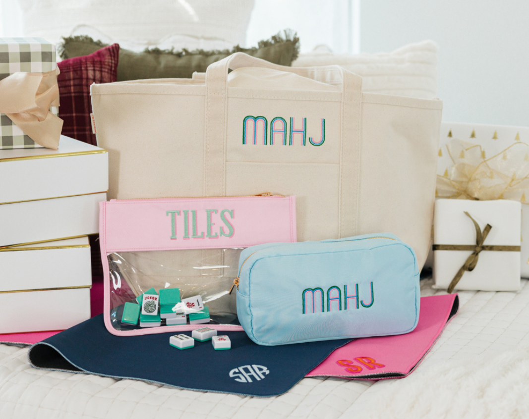 Personalized mahjong gifts are displayed for holiday gifting.