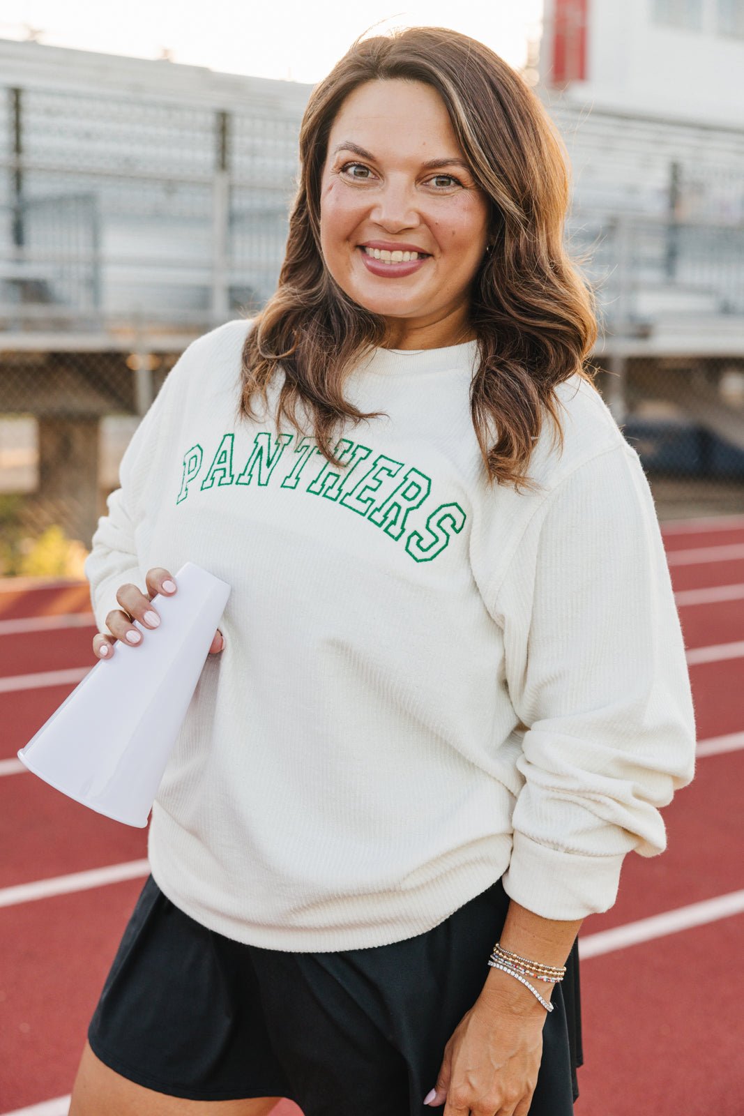 White “BULLDOGS” crewneck sweatshirt paired with cream-red trucker hat embroidered “#17’s Mom” bundle.
