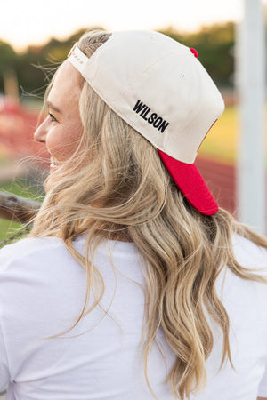 Side view of woman in backward Custom #'s Mom 3D Puff Vintage Trucker Hat, red brim, name detail “WILSON.”