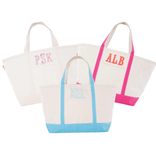 Classic canvas tote with applique lettering, a chic and personalized gift for any occasion.