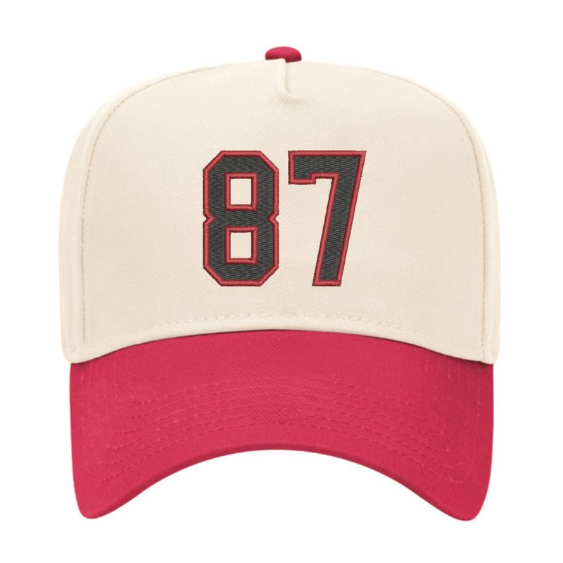 Cream/red Embroidered Jersey Number Vintage Trucker Hat with bold appliqué “87” on the crown.