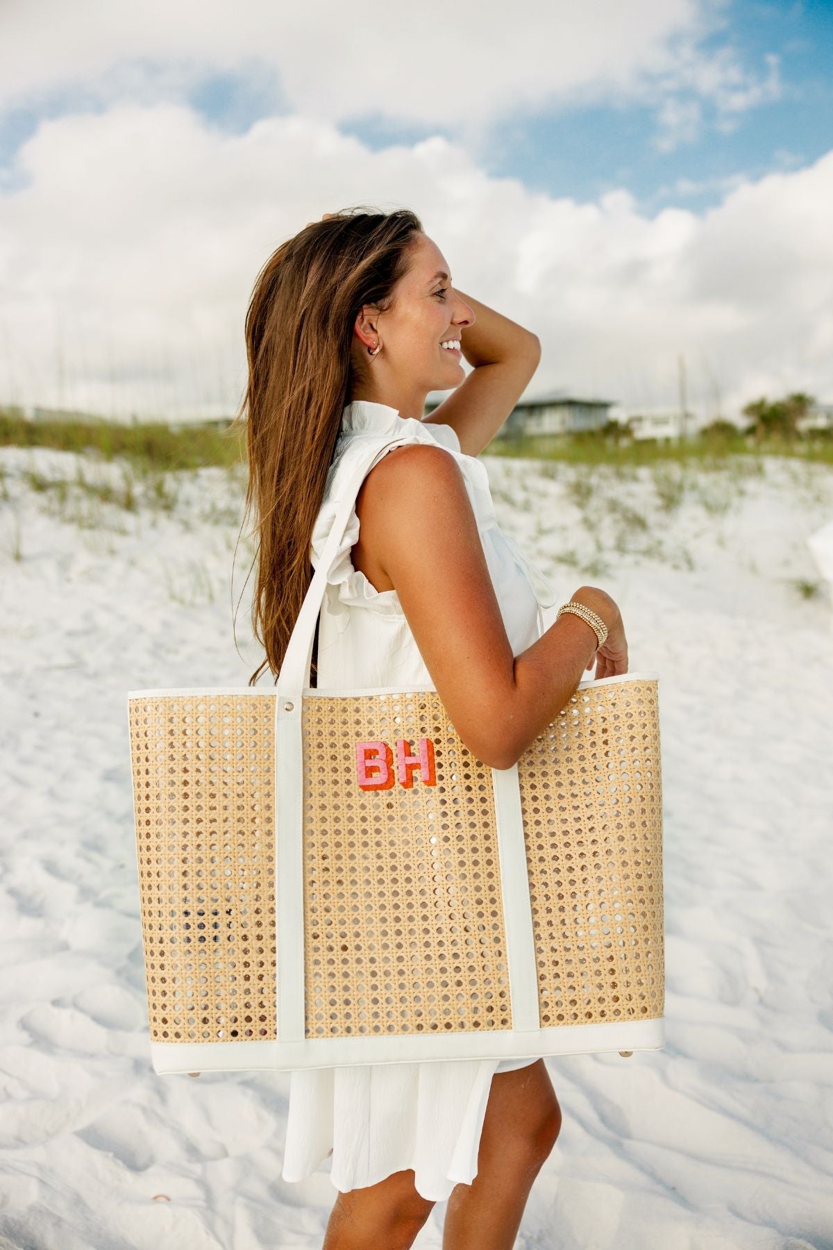 A canning tote is customized with a navy blue monogram