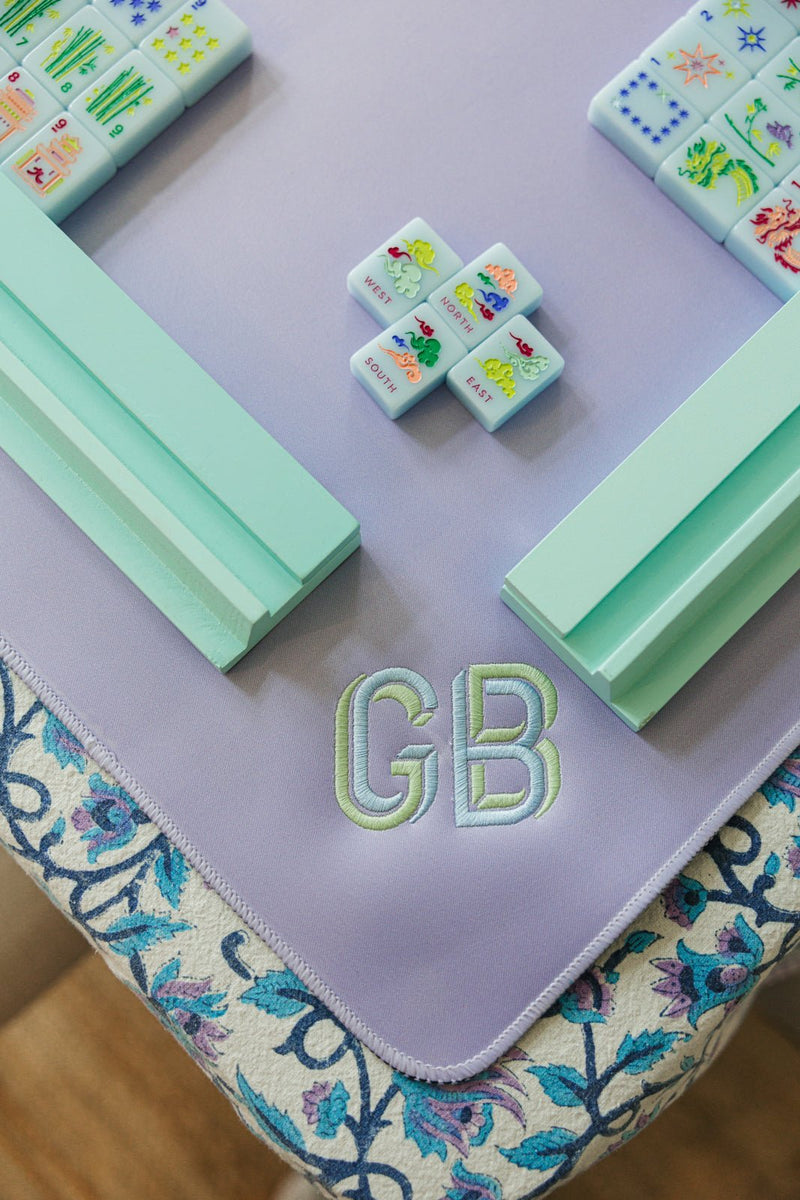 Lavender embroidered mahjong tile mat with custom monogram chic gaming table accessory.