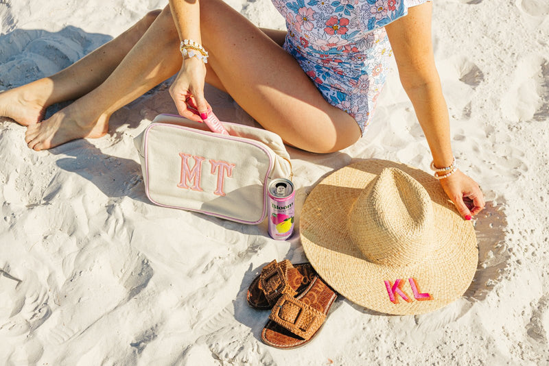 Straw beach hat embroidered with custom initials, perfect monogrammed sun hat for vacation.