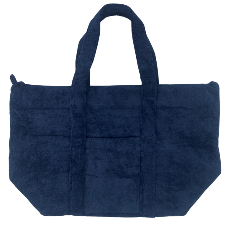 Navy terry cloth tote with embroidered details, perfect beach or poolside bag.