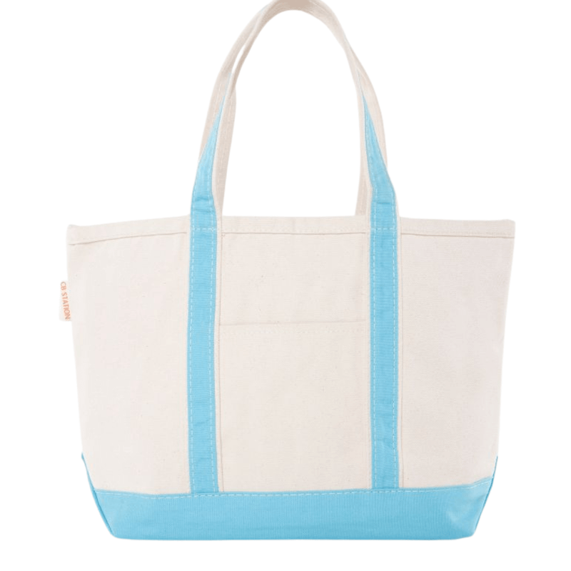 Natural canvas tote bag with light blue handles and base