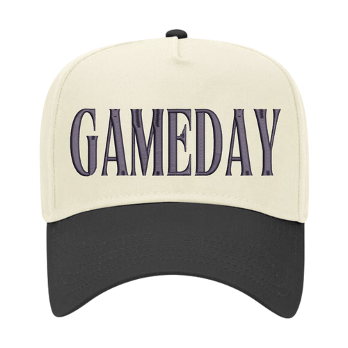 Cream-front vintage trucker hat with black brim, featuring raised black puff embroidery spelling “GAMEDAY.”