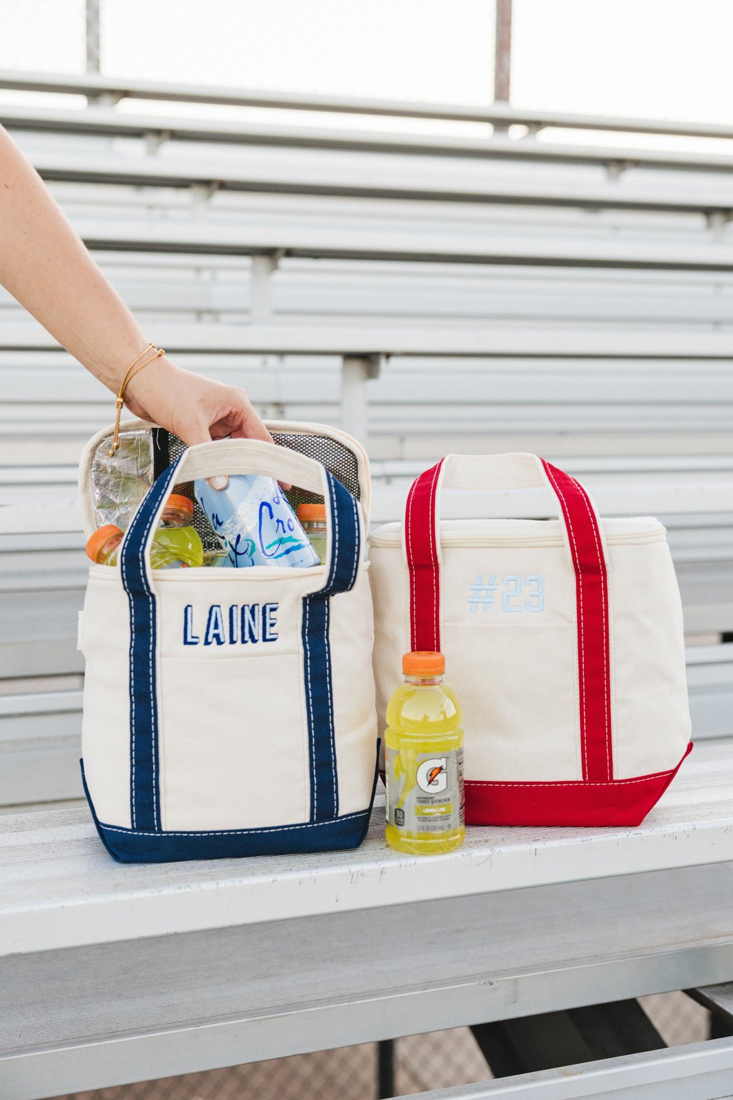 Three cooler totes with green “HSA,” red “MILLER,” and navy “#12” embroidery – Gameday Cooler Tote