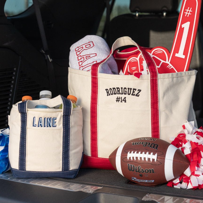 Gameday Essentials Bundle with white “BULLDOGS” sweatshirt, “GAMEDAY” hat, custom totes, and personalized pool bag.