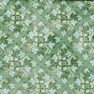 Personalized hanging toiletry bag in green floral print with monogram, ideal travel gift from Sprinkled With Pink