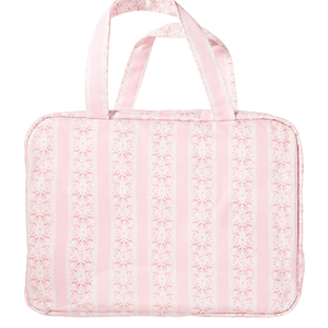 Pink striped hanging toiletry bag with dual handles, wipeable coating, and monogram personalization option.