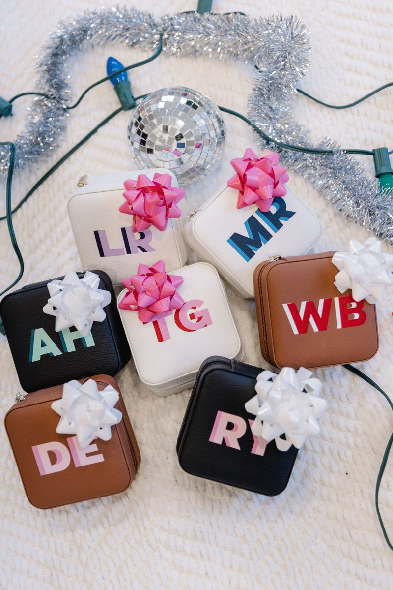 Personalized jewelry cases with shadow monograms, custom travel gifts