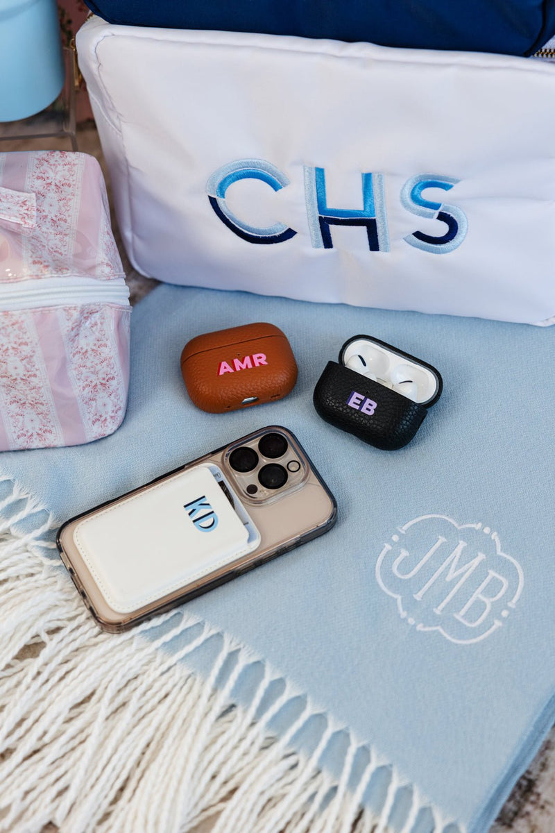 Personalized leather phone wallet with initials, custom everyday accessory.