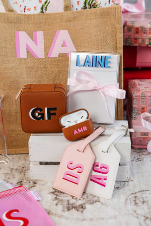 Personalized luggage tags with embroidered initials, custom travel essentials