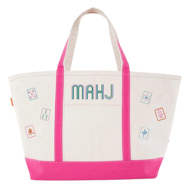White canvas boat tote with pink trim, embroidered "MAHJ" and colorful mahjong tile icon patches