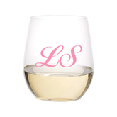 Personalized Monogrammed Stemless Wine Glass (Set of 4) from Sprinkled With Pink, featuring elegant pink script initials "LS" on a sleek, curved glass—perfect for bridal showers, gifts, or everyday entertaining.