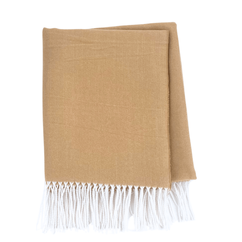 Classic camel Monogrammed Woven Blanket folded with white fringe, ideal for personalized embroider