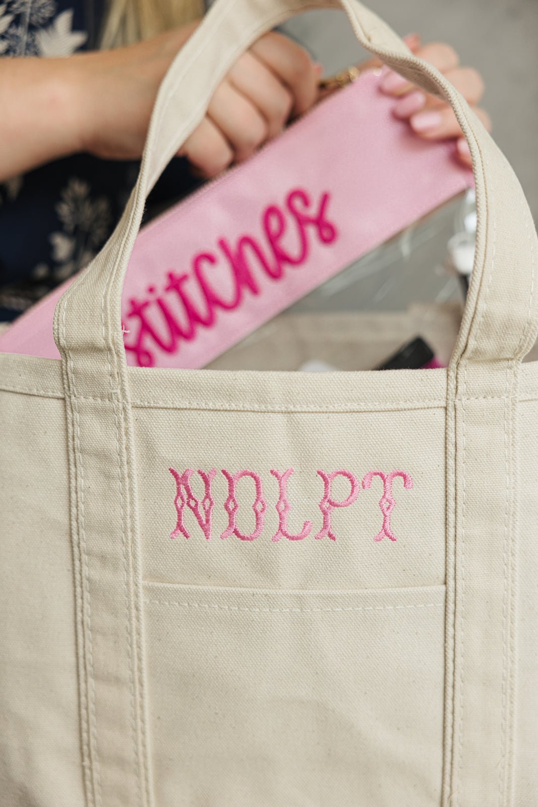 Personalized Needlepoint Canvas Project Tote in pink, blue, and white, perfect for craft storage.