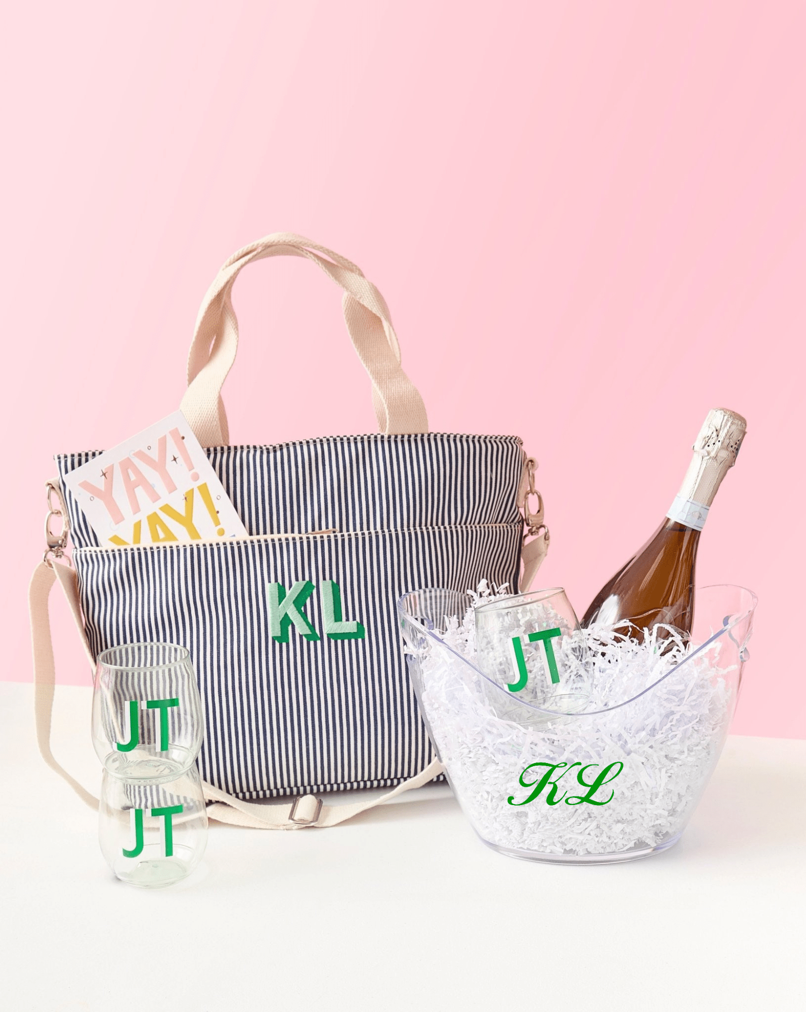 Clear Script Monogram Wide Ice Bucket by Sprinkled With Pink, featuring elegant pink "LS" initials. This personalized acrylic bucket adds a custom touch to entertaining setups, perfect for chilling wine or champagne at weddings, bridal showers, or hostess gifting.