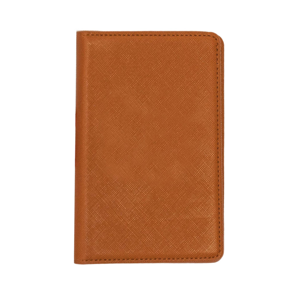 Tan leather passport holder with shadow monogram, personalized travel essential.