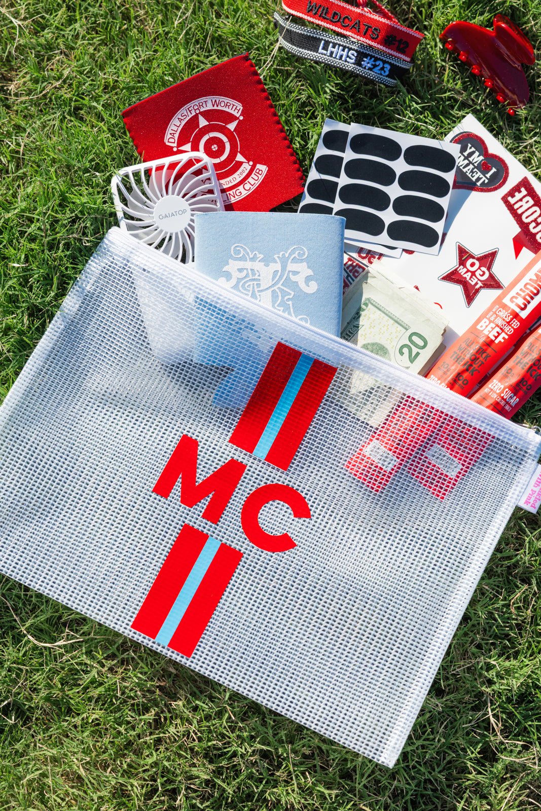 Three clear nylon pool bags in pink, teal, and white with bold stripes and monograms: “TL,” “KS,” and “MW.”