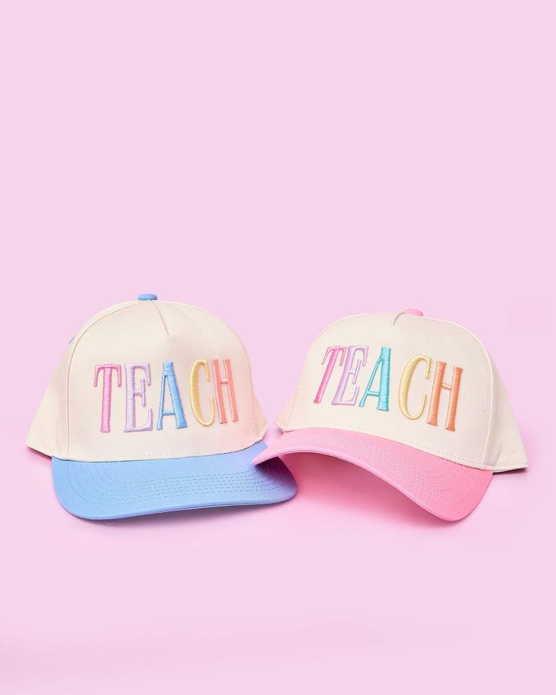Teach 3D Puff Trucker Hats – @PBANDJ4THGRADE x SWP: cream front panels with pastel rainbow 3D puff “TEACH” embroidery and blue & pink mesh brims