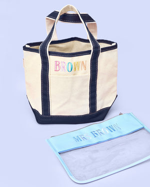 Teacher Tote & Pouch Bundle – @PBANDJ4THGRADE x SWP: natural canvas tote with navy-blue trim and matching clear nylon pouch with baby-blue trim