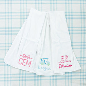 Three personalized baby towels. All with unqiue designs