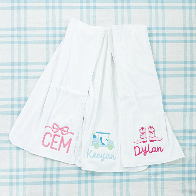 Three personalized baby towels. All with unqiue designs