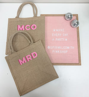 Monogrammed totes with pink shadowed lettering
