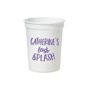A white stadium cup that reads "Catherine's Last Splash"