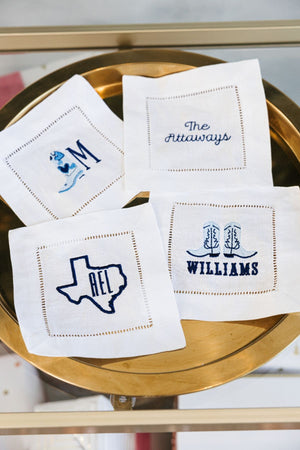 A set of 4 custom embroidered cocktail napkins