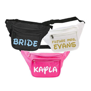 Three fanny packs in black, pink, and white with magical adventure font customization