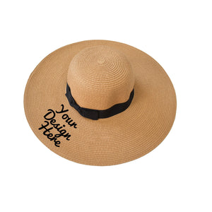 A floppy beach hat with black ribbon that can be customized