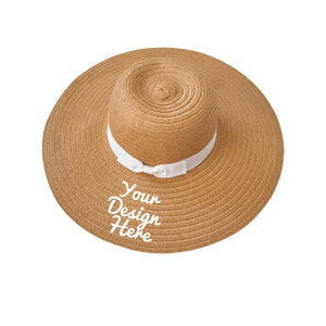 A floppy beach hat with white ribbon that can be customized