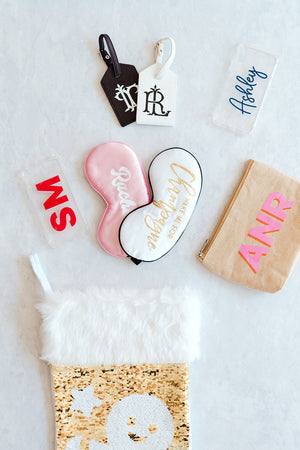 An assortment of customized products are laid out to show what items make great stocking stuffers.