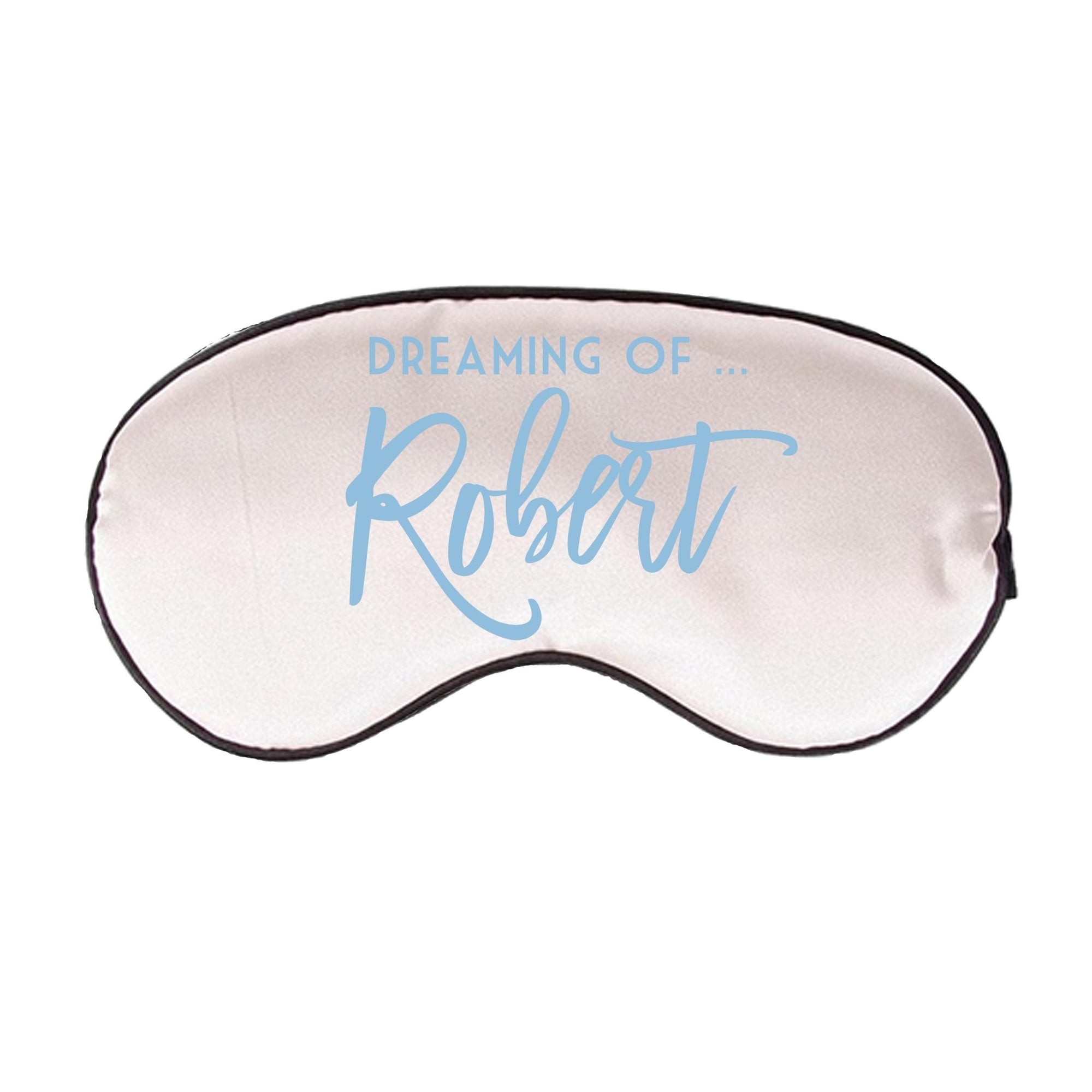 A sleep mask is customized to read "Dreaming of... Matthew"