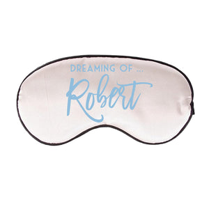 A sleep mask is customized to read "Dreaming of... Robert"