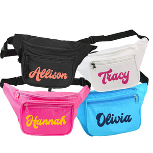 Fanny packs in four different colors with custom names in a retro font