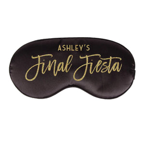 A black sleep mask reads "Ashley's Final Fiesta" in gold glitter.