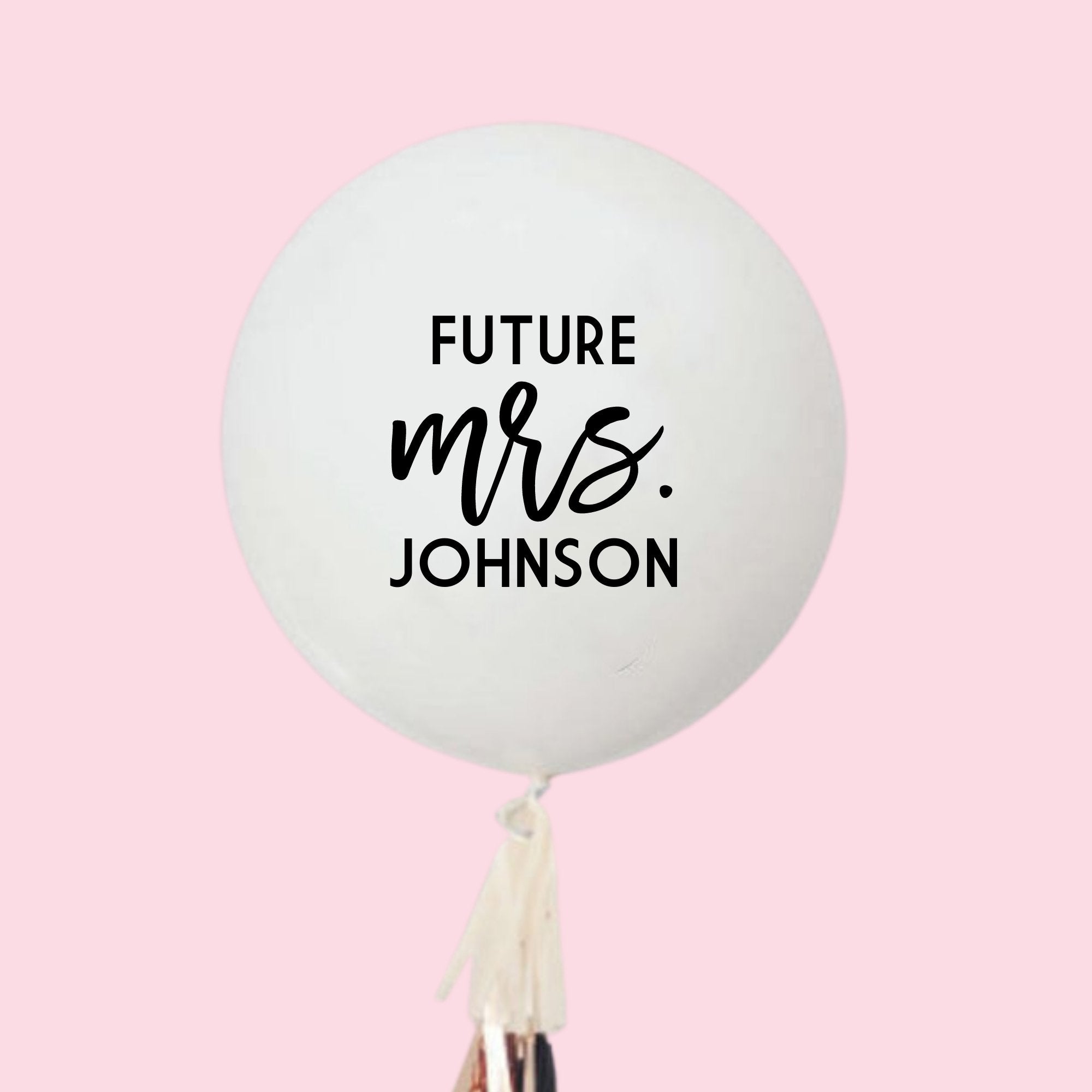 A white jumbo balloon reads "Future Mrs. Johnson"