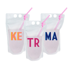 Party pouches with varying monograms and monogram colors