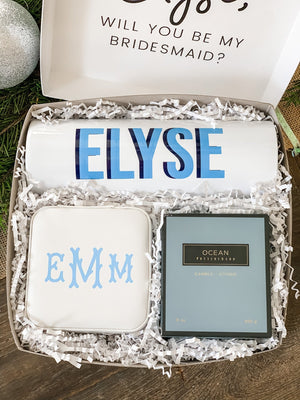 A bridesmaid proposal box filled with personalized goodies 