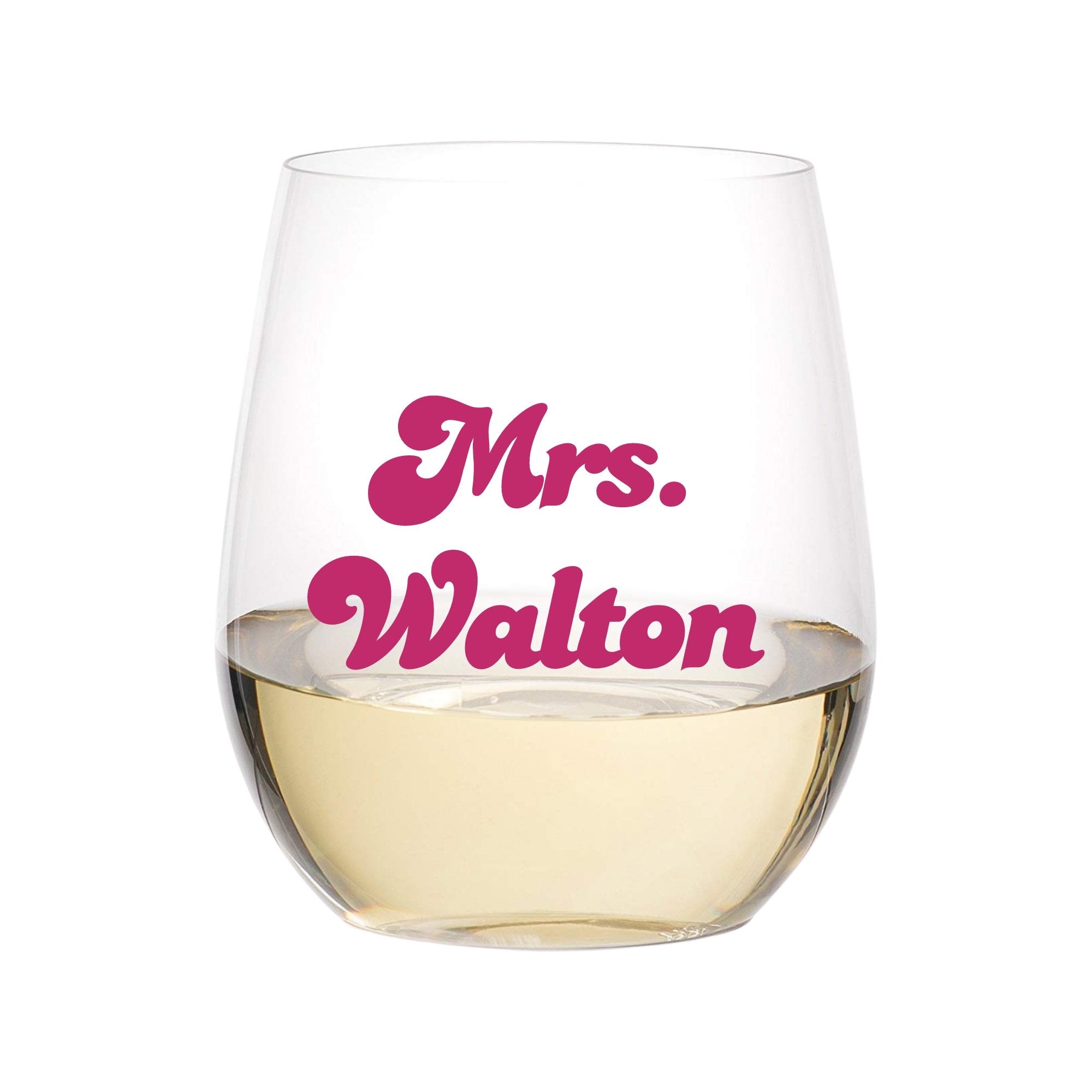 A clear acrylic wine glass reads "Mrs. Walton" in a retro font