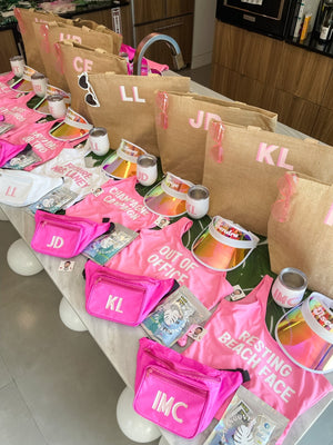Bachelorette party goody bags laid out on a table