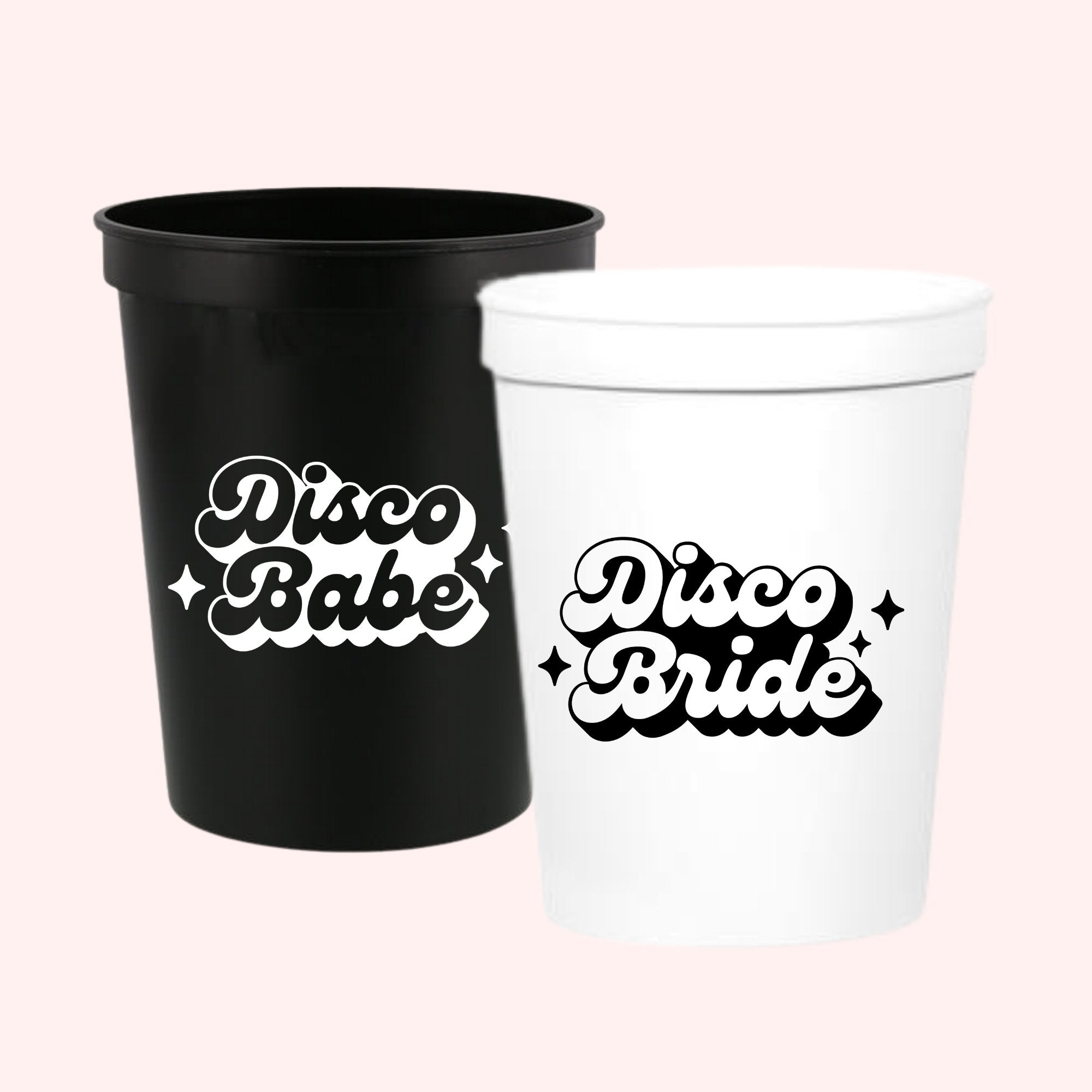 Black and white stadium cups that read "Disco Bride" and "Disco Babe"