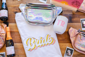 A group of customized products are laid out for a bride to be 