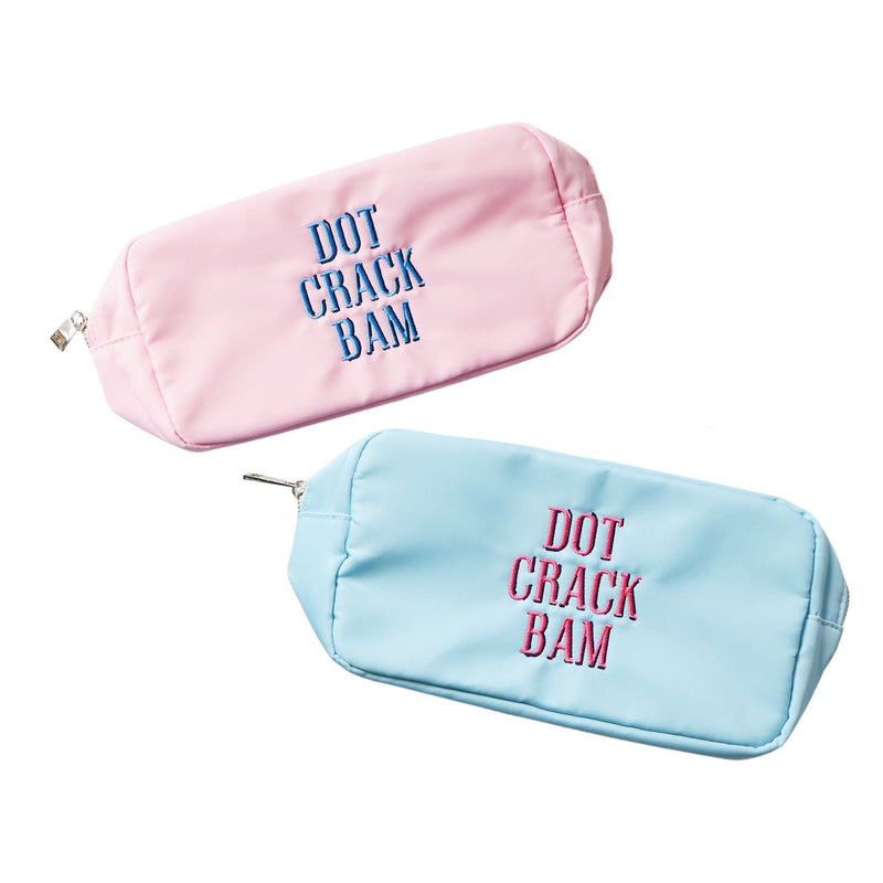 Two large nylon pouches in blue and pink with "Dot Crack Boom" embroidered on the front